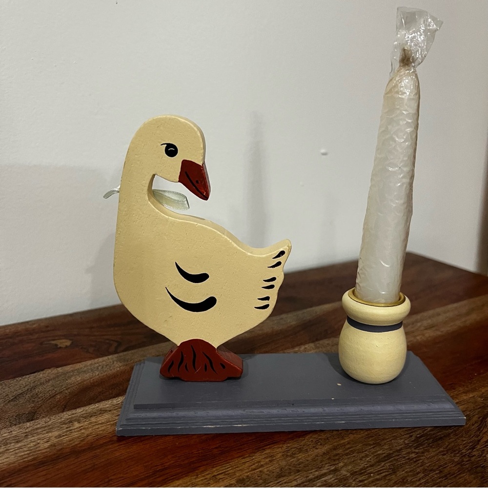 Vintage wooden duck candle holder.
